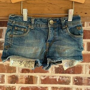Justice Jean shorts With sequin peekaboo pocket
